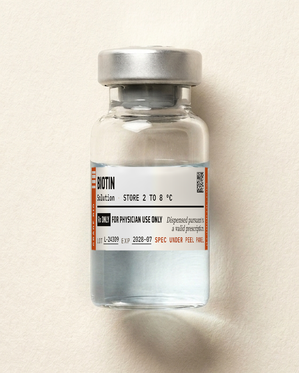 Biotin, a clear, colorless solution, free of visible particulate in a sealed glass vial.