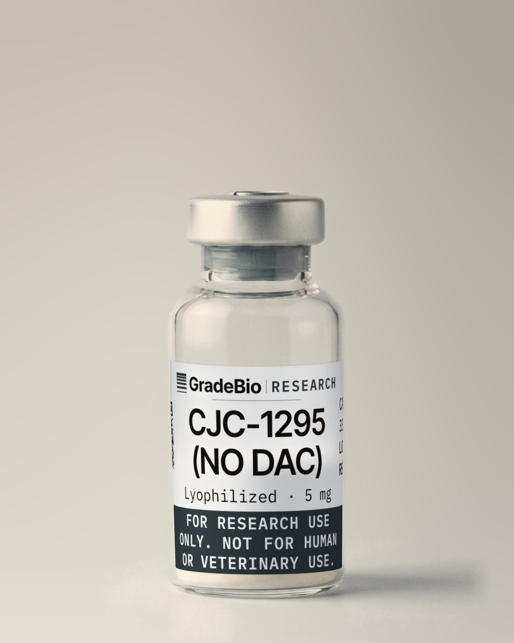 CJC-1295 (no DAC) as supplied — Lyophilized, 5 mg, white to off-white lyophilized cake, in a 2 mL vial with an aluminum crimp seal, the label facing the camera.